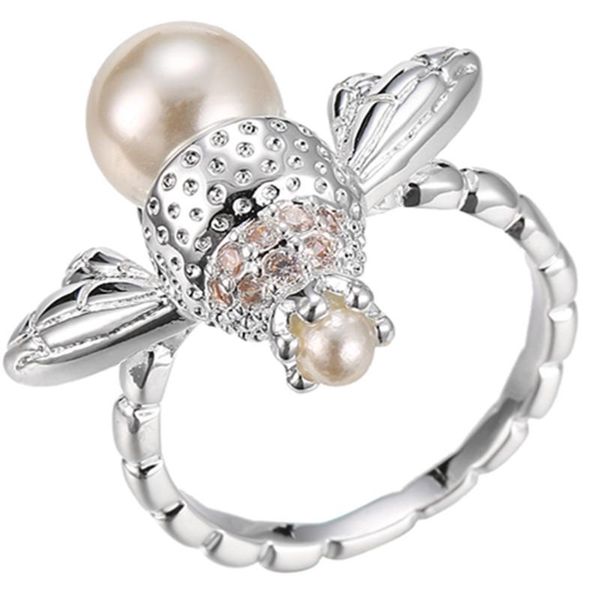 cluster rings the silver and gold color ring classic exquisite dazzling temperament female models bee inlaid pearl zircon hand jewelry, Golden;silver
cluster rings the silver and gold color ring classic exquisite dazzling temperament female models bee inlaid pearl zircon hand jewelry, Golden;silver