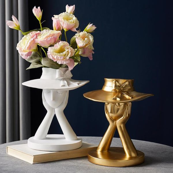 vases modern decoration for flowers character resin sculpture living room gold vase gifts
vases modern decoration for flowers character resin sculpture living room gold vase gifts