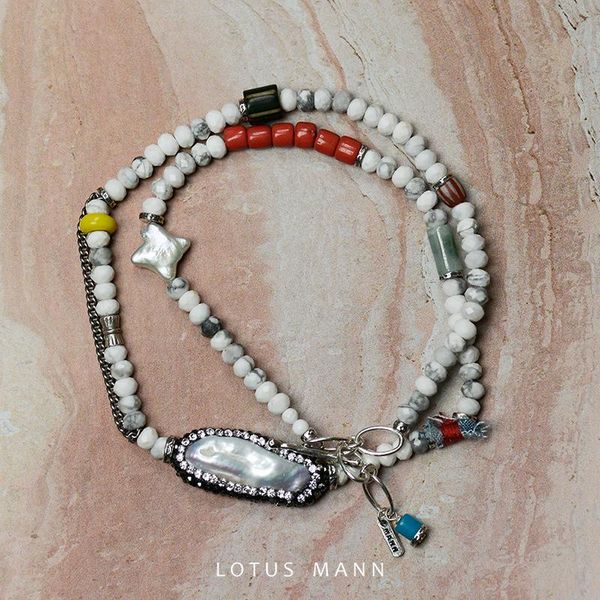 lotus mann baroque pearl and white turquoise howlite necklace chains, Silver
lotus mann baroque pearl and white turquoise howlite necklace chains, Silver