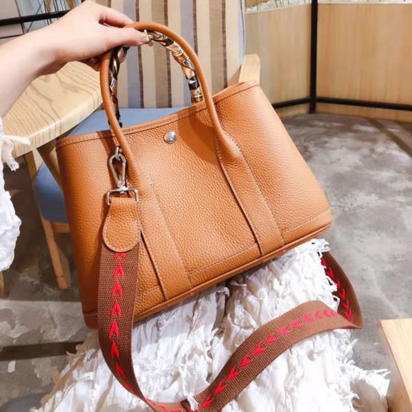 2021 designer ladies handbag leather shoulder bag garden party mother and child large crossbody wallet cowhide lychee pattern clutch wholesa
2021 designer ladies handbag leather shoulder bag garden party mother and child large crossbody wallet cowhide lychee pattern clutch wholesa