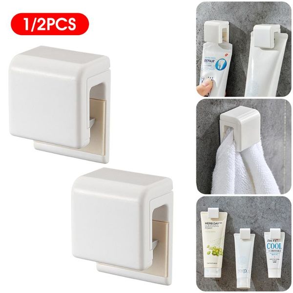 1/2pcs/lot adhesive seamless toothpaste hanging holder clip facial cleanser organizer wall mount stand bathroom accessories kitchen storage
1/2pcs/lot adhesive seamless toothpaste hanging holder clip facial cleanser organizer wall mount stand bathroom accessories kitchen storage