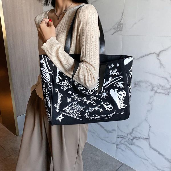 fashion graffiti canvas shoulder bag 2021 large women handbags leisure travel totes female messenger crossbody shopper bags
fashion graffiti canvas shoulder bag 2021 large women handbags leisure travel totes female messenger crossbody shopper bags