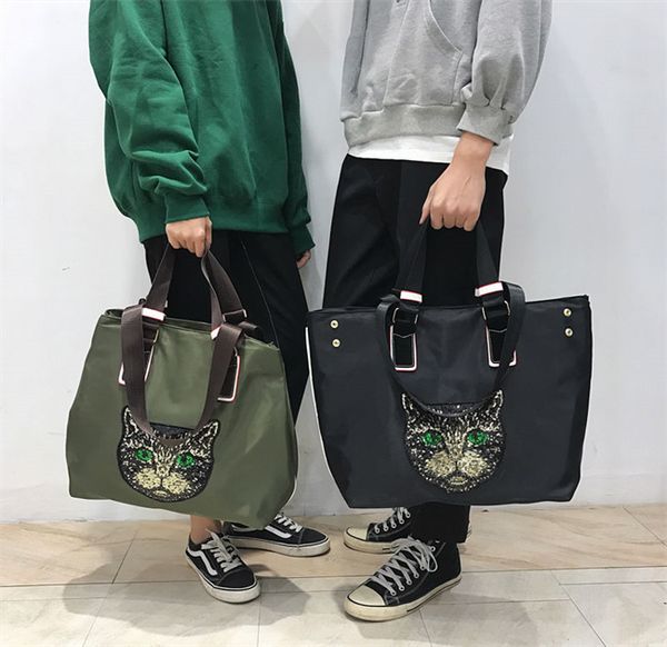 designers duffel bags 45cm 55cm luxury large capacity travel sale women men genuine leather shoulder fashion bag carry rivets with lock head
designers duffel bags 45cm 55cm luxury large capacity travel sale women men genuine leather shoulder fashion bag carry rivets with lock head