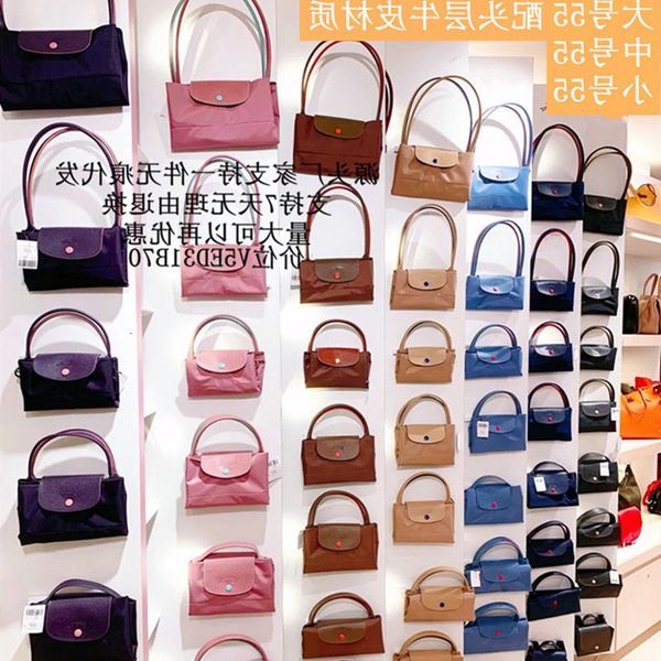 high version french longxiang dumpling bag 70th anniversary embroidery large capacity hand tote one shoulder
high version french longxiang dumpling bag 70th anniversary embroidery large capacity hand tote one shoulder
