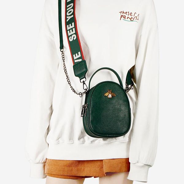 evening bags korean ins temperament bag girl 2021 women's fashion wide shoulder strap slant water tote pu bee
evening bags korean ins temperament bag girl 2021 women's fashion wide shoulder strap slant water tote pu bee