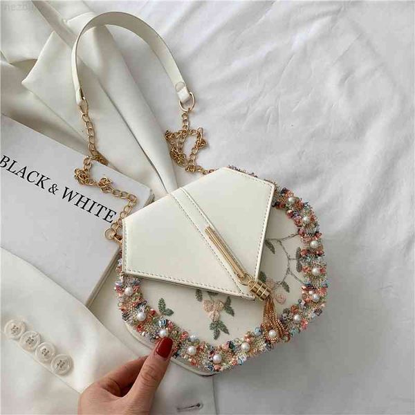the chain box women's summer pu leather shoulder fashion pearl edge crossbody cups for name 2021 luxury handbag design
the chain box women's summer pu leather shoulder fashion pearl edge crossbody cups for name 2021 luxury handbag design