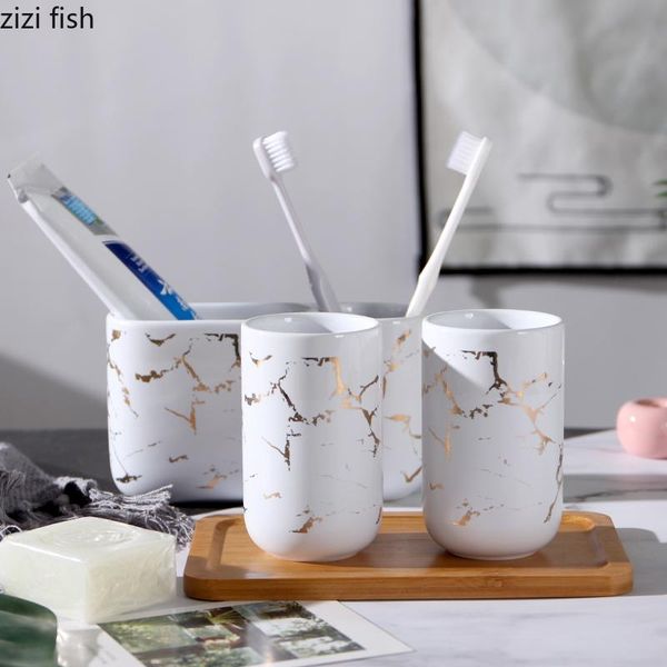 bath accessory set white golden marble texture bathroom accessories toothbrush holder/mouthwash cup/wood tray brief ceramic supplies 
bath accessory set white golden marble texture bathroom accessories toothbrush holder/mouthwash cup/wood tray brief ceramic supplies