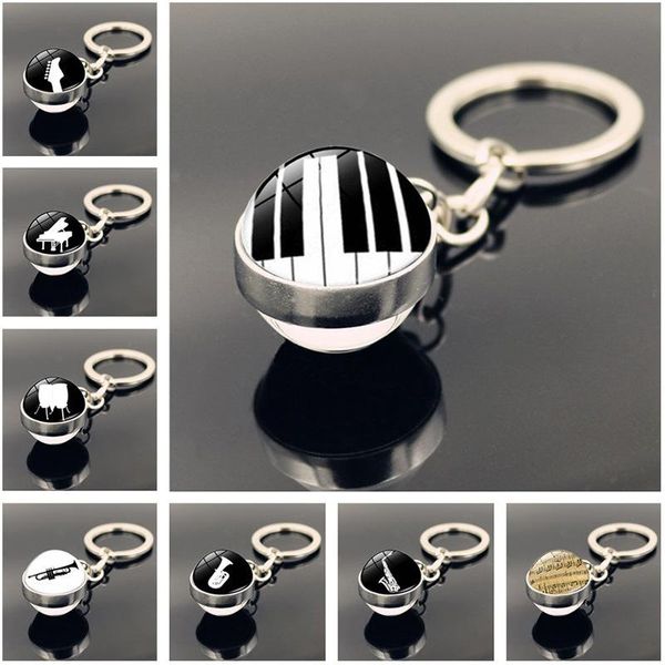 keychains vintage piano keys, golden notes, double-sided crystal ball key ring, classic piano, keyboard, musician lover jewelry, Silver
keychains vintage piano keys, golden notes, double-sided crystal ball key ring, classic piano, keyboard, musician lover jewelry, Silver