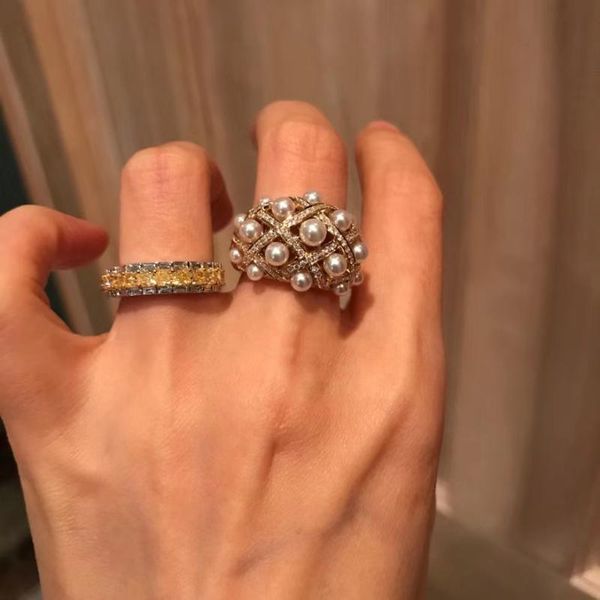 cluster rings design big imitation pearl zircon ring for women elegant anniversary party brand style fine jewelry, Golden;silver
cluster rings design big imitation pearl zircon ring for women elegant anniversary party brand style fine jewelry, Golden;silver