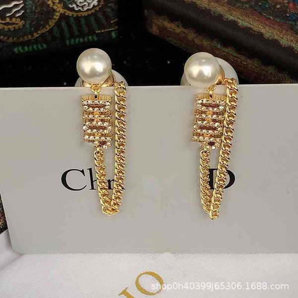 75% off outlet online new tassel front and back pearl letter net red same earrings s925 silver needle, Golden
75% off outlet online new tassel front and back pearl letter net red same earrings s925 silver needle, Golden
