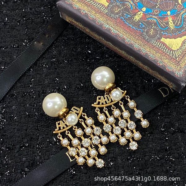 d family / di family's new front back pearl female letters tassel earrings fashionable and versatile s925, Golden
d family / di family's new front back pearl female letters tassel earrings fashionable and versatile s925, Golden