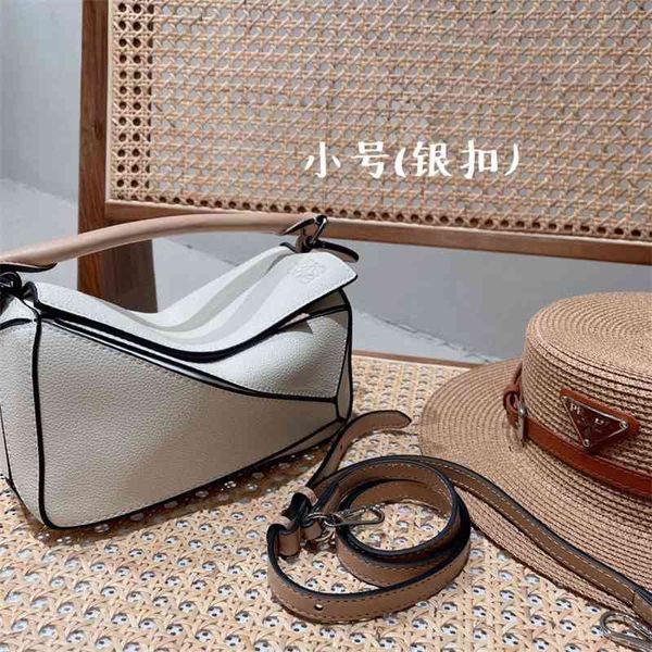 handbag star's same stitching geometric bag, rhombic color matching pillow, head cover, cow leather shoulder small size 20 * 12 hileng 
handbag star's same stitching geometric bag, rhombic color matching pillow, head cover, cow leather shoulder small size 20 * 12 hileng