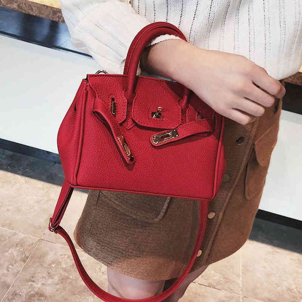 2021 new mini lychee pattern single shoulder women's hand slung fashion small bag 
2021 new mini lychee pattern single shoulder women's hand slung fashion small bag