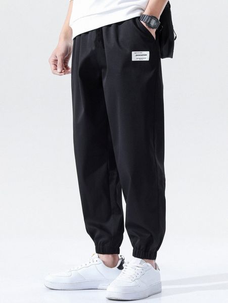men letter patched carrot pants 12y9#, Black
men letter patched carrot pants 12y9#, Black