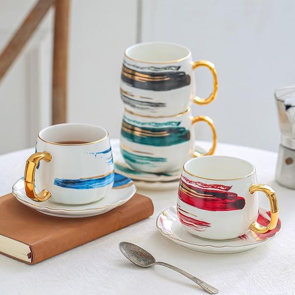mugs ink painting series matte gold coffee cup creative watercolor ceramic teacup mug with plate
mugs ink painting series matte gold coffee cup creative watercolor ceramic teacup mug with plate