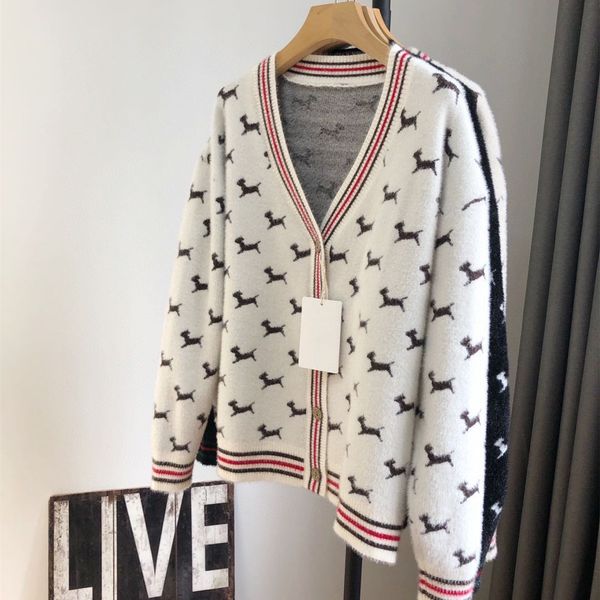 8807 all over print small hook knitted cardigan autumn new women's coat loose sweater qingdao, White
8807 all over print small hook knitted cardigan autumn new women's coat loose sweater qingdao, White