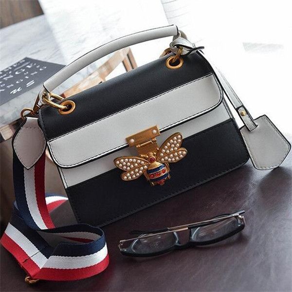 wholesale women bag street trend contrast leather handbag personality wide shoulder strap color matching messenger bags small fresh pearl studded handbags
wholesale women bag street trend contrast leather handbag personality wide shoulder strap color matching messenger bags small fresh pearl studded handbags