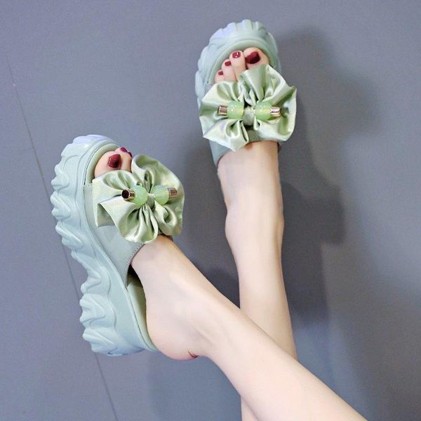 slippers summer trend slope heel thick bottom 8.5 cm ladies casual elegant bow comfortable beach shoes non-slip., Black
slippers summer trend slope heel thick bottom 8.5 cm ladies casual elegant bow comfortable beach shoes non-slip., Black