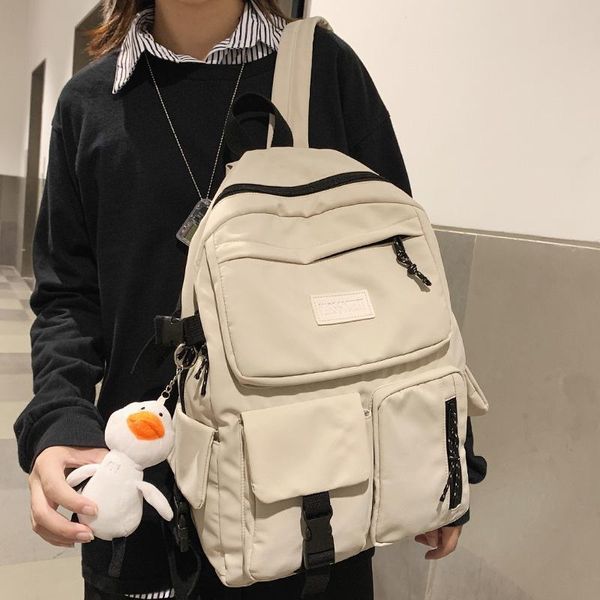 multiple pockets waterproof nylon women backpack pure color button large capacity schoolbags for students travel bag
multiple pockets waterproof nylon women backpack pure color button large capacity schoolbags for students travel bag