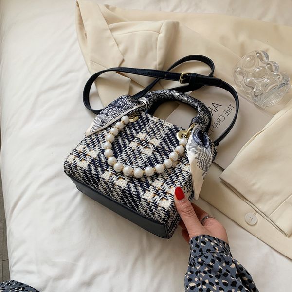 2021 new female thousand bird lattice portable pearl chain diana woolen single shoulder messenger bag tide woven
2021 new female thousand bird lattice portable pearl chain diana woolen single shoulder messenger bag tide woven