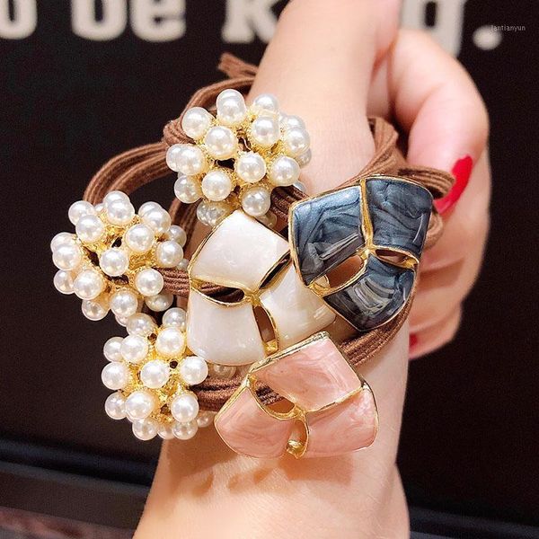 women elegant pearls geometric elastic hair bands ponytail holder sweet scrunchie rubber headband fashion accessories1
women elegant pearls geometric elastic hair bands ponytail holder sweet scrunchie rubber headband fashion accessories1