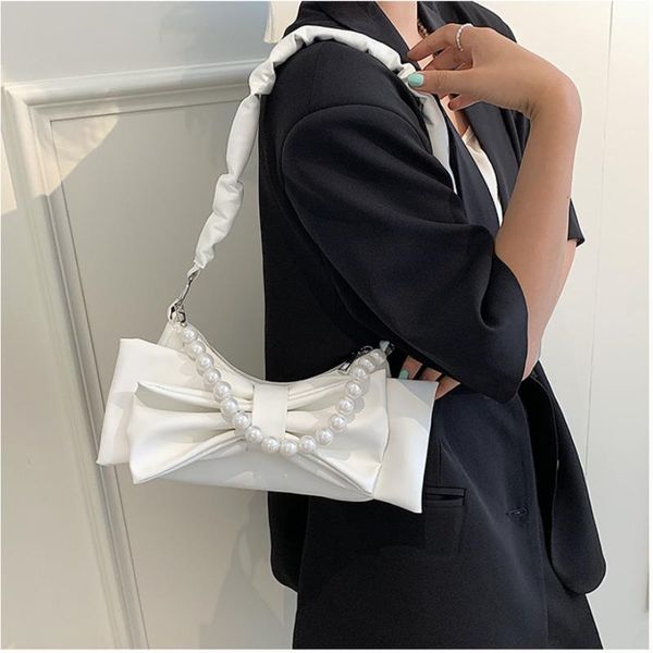 evening bags 2021 summer korean fashion bowknot pearl underarm bag women's single shoulder messenger
evening bags 2021 summer korean fashion bowknot pearl underarm bag women's single shoulder messenger