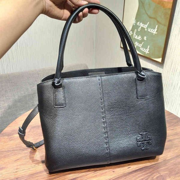 2021 new tb women's bag litchi grain cowhide hand leisure commuting diagonal straddle single shoulder simple 704
2021 new tb women's bag litchi grain cowhide hand leisure commuting diagonal straddle single shoulder simple 704