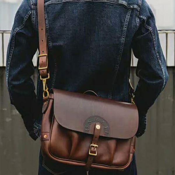 large capacity postman bag vegetable tanned leather men's locomotive briefcase japane top 
large capacity postman bag vegetable tanned leather men's locomotive briefcase japane top