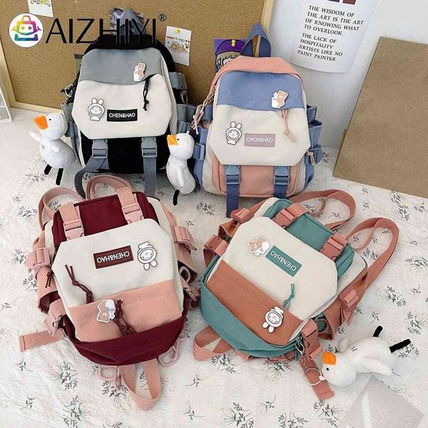 fashion preppy style women cartoon printing contrast color backpack with pendant casual girls students travel schoolbag knapsack y1105
fashion preppy style women cartoon printing contrast color backpack with pendant casual girls students travel schoolbag knapsack y1105