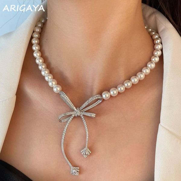 chains arigaya elegant solid 925 sterling silver with created moissanite diamond pearl bowknot wedding necklace fine jewelry
chains arigaya elegant solid 925 sterling silver with created moissanite diamond pearl bowknot wedding necklace fine jewelry