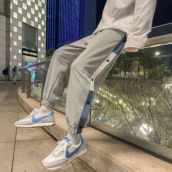 men's pants 2021-side strip seam breasted male loose casual pants, versatile sports, Black 
men's pants 2021-side strip seam breasted male loose casual pants, versatile sports, Black