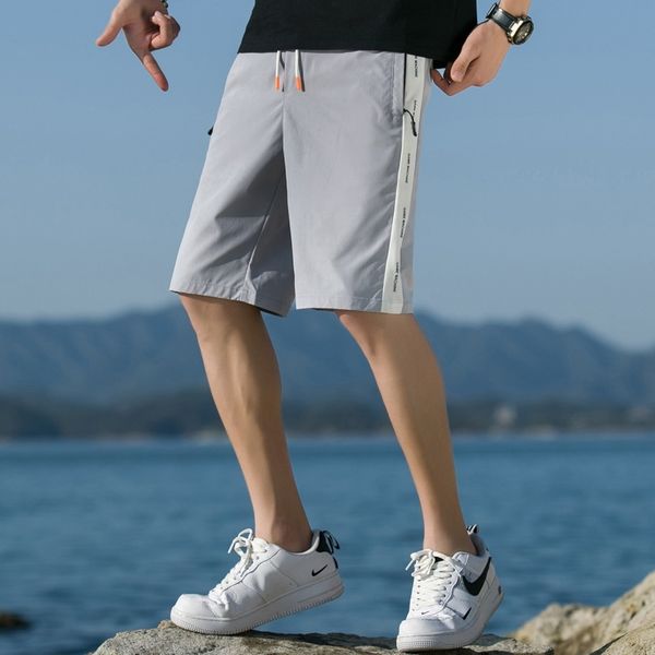 men's casual shorts new brand summer fashion trend beach pants thin quick drying capris, White;black
men's casual shorts new brand summer fashion trend beach pants thin quick drying capris, White;black