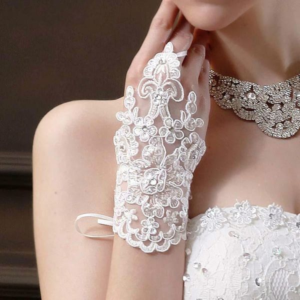 bridal gloves design lace sequines beaded for wedding dresses fingerless, White
bridal gloves design lace sequines beaded for wedding dresses fingerless, White