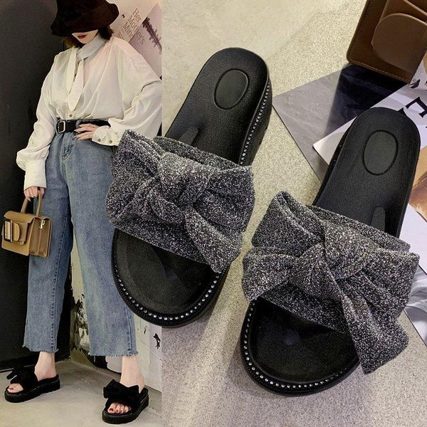 slippers summer casual beach shoes elegant bowknot thick bottom non-slip wear-resistant fashion black ladies slippers.
slippers summer casual beach shoes elegant bowknot thick bottom non-slip wear-resistant fashion black ladies slippers.