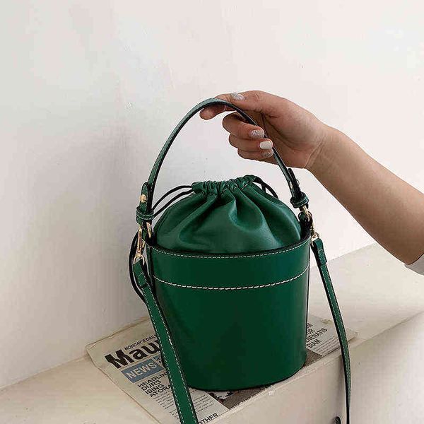 tote bucket bag 2021 summer fashion new high-quality pu leather women's designer handbag drawstring shoulder messenger
tote bucket bag 2021 summer fashion new high-quality pu leather women's designer handbag drawstring shoulder messenger