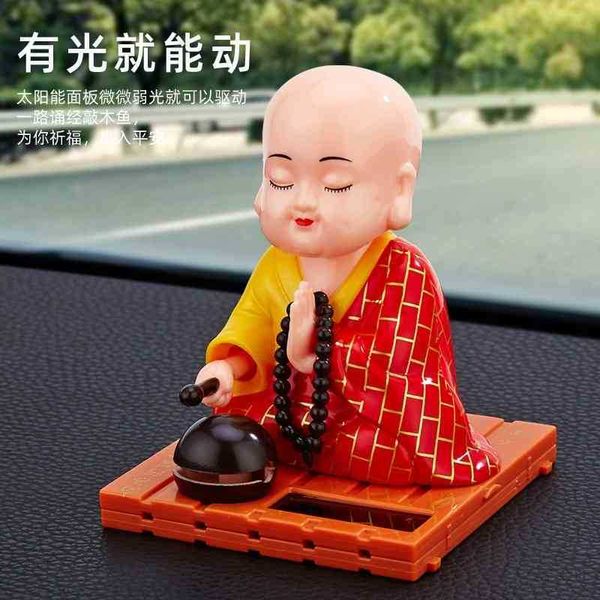 car solar cartoon creative knock wooden fish car decorative gifts with little monk ornaments
car solar cartoon creative knock wooden fish car decorative gifts with little monk ornaments