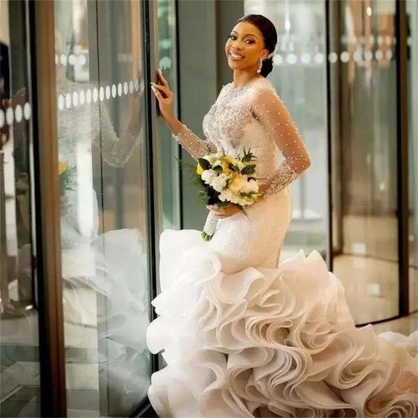 dubai pearls wedding dresses tier ruffles train mermaid bridal gowns sheer long sleeve customise vintage robe de soirée, White
dubai pearls wedding dresses tier ruffles train mermaid bridal gowns sheer long sleeve customise vintage robe de soirée, White