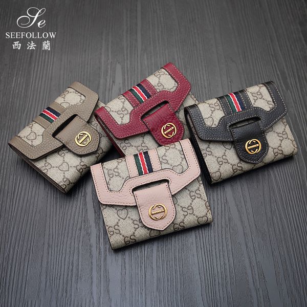 sole by designer fashion new small wallet women's short leather multi card folding cowhide three fold wallet simple buckle fashion purs, Brown;gray
sole by designer fashion new small wallet women's short leather multi card folding cowhide three fold wallet simple buckle fashion purs, Brown;gray