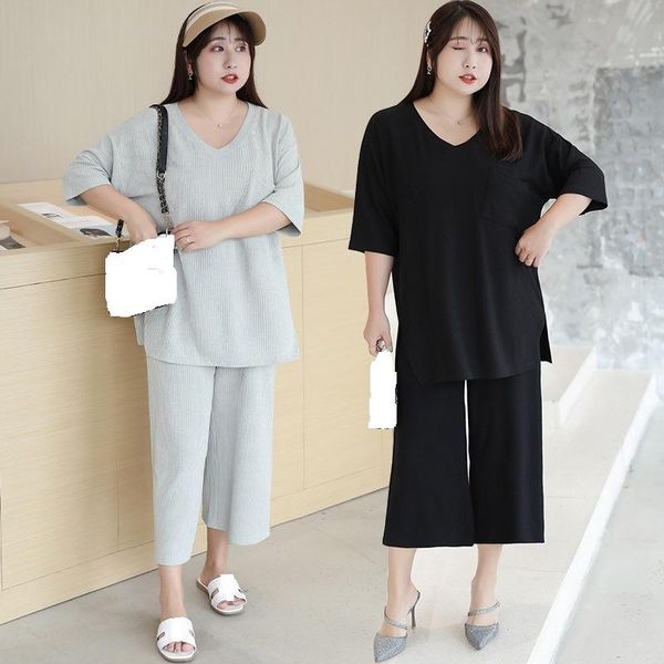 women's tracksuits set summer black short sleeve shirt and calf lenght pants sets lady casual solid two piece 4xl, Gray
women's tracksuits set summer black short sleeve shirt and calf lenght pants sets lady casual solid two piece 4xl, Gray