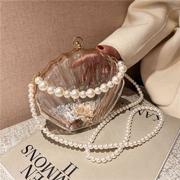 transparent handbag elegant pearl chain crossbody bag for women acrylic clutch purse evening bag for wedding party zd2117
transparent handbag elegant pearl chain crossbody bag for women acrylic clutch purse evening bag for wedding party zd2117