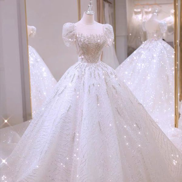 sparkly crystals sequined ball gown wedding dresses 2022 sheer neck short puff sleeves luxurious arabic bridal gowns princess long train ves, White
sparkly crystals sequined ball gown wedding dresses 2022 sheer neck short puff sleeves luxurious arabic bridal gowns princess long train ves, White