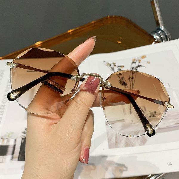 outdoor eyewear rimless sunglasses women men brand design fashion shades small sun glasses for female summer traveling brown oculos
outdoor eyewear rimless sunglasses women men brand design fashion shades small sun glasses for female summer traveling brown oculos