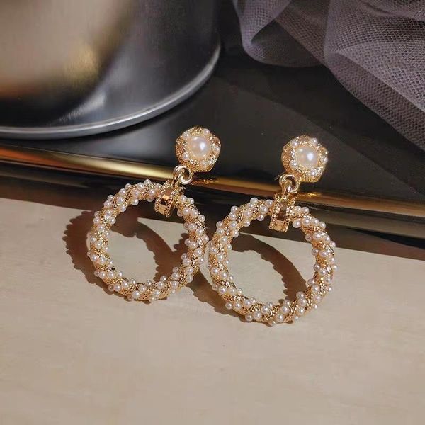 twist ring imitation pearl hanging dangle fashion stud earrings korean hollow out contracted vintage elegant women's, Golden;silver
twist ring imitation pearl hanging dangle fashion stud earrings korean hollow out contracted vintage elegant women's, Golden;silver
