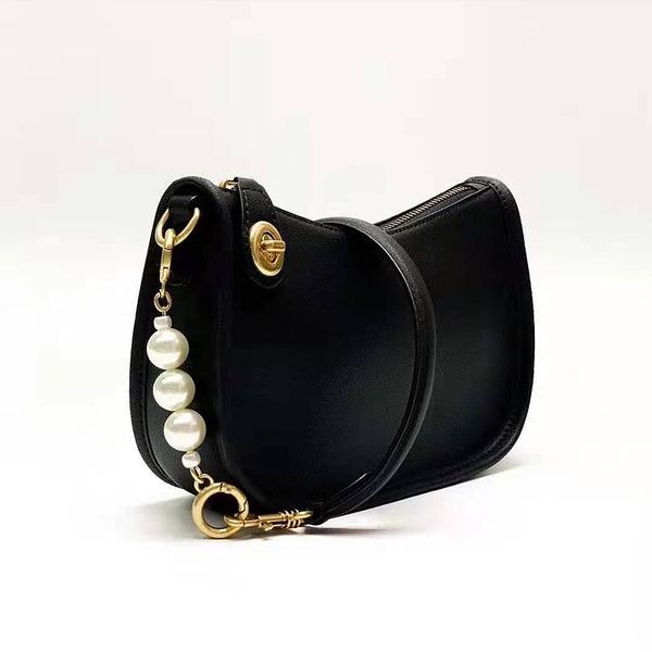 evening bags female bag 2021 hit women's handbags pearl pendant leather small shoulder with short straps baguette
evening bags female bag 2021 hit women's handbags pearl pendant leather small shoulder with short straps baguette