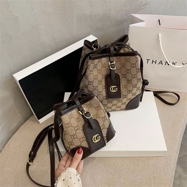 purse women's new bucket large capacity versatile single shoulder bag portable messenger bag signatureable and advanced
purse women's new bucket large capacity versatile single shoulder bag portable messenger bag signatureable and advanced