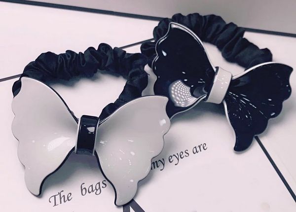 7x5cm black and white acrylic hair band europe and the united states popular bow rubber band head rope detachable cloth ring counter gifts, Pink
7x5cm black and white acrylic hair band europe and the united states popular bow rubber band head rope detachable cloth ring counter gifts, Pink