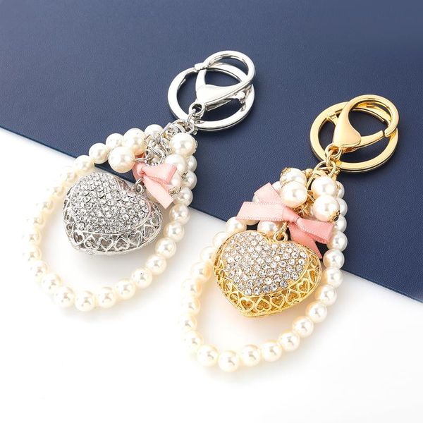 keychains alloy rhinestone imitation pearl love string keychain 2021 fashion car key ring girl bag accessories ornaments small gifts, Silver
keychains alloy rhinestone imitation pearl love string keychain 2021 fashion car key ring girl bag accessories ornaments small gifts, Silver