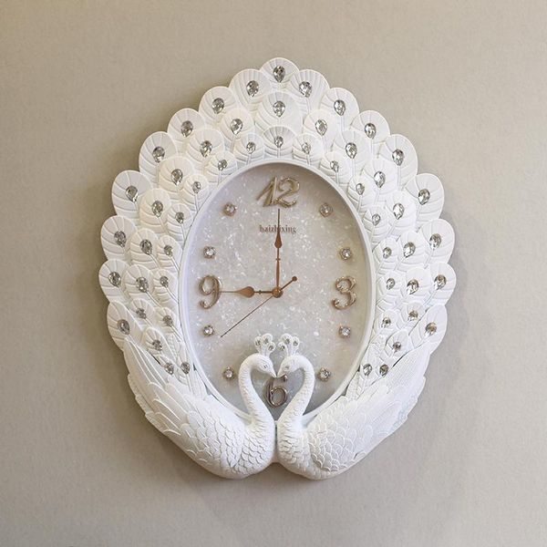 wall clocks european style living room creative peacock white acrylic crystal clock quartz movement simple modern luxury home decor
wall clocks european style living room creative peacock white acrylic crystal clock quartz movement simple modern luxury home decor