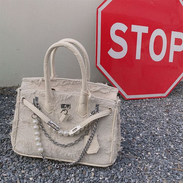 beggar kelly small group handmade denim bag splicing military canvas portable versatile fashion girl
beggar kelly small group handmade denim bag splicing military canvas portable versatile fashion girl