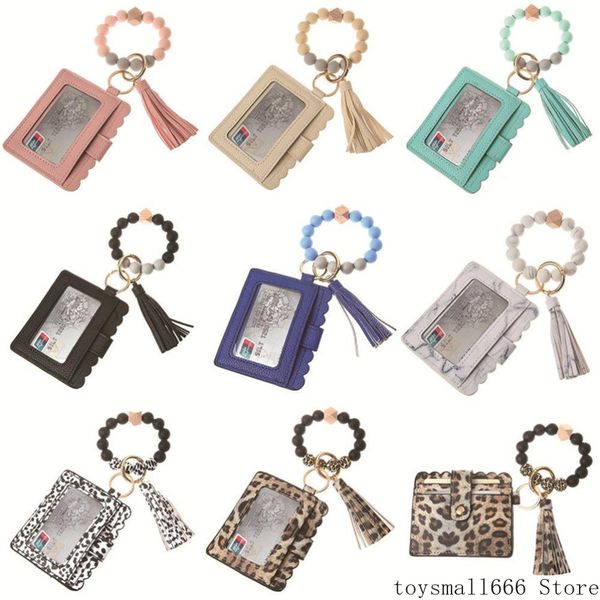 fashion pu leather bracelet wallet keychain party favor tassels bangle key ring holder card bag silicone beaded wristlet keychains handbag w
fashion pu leather bracelet wallet keychain party favor tassels bangle key ring holder card bag silicone beaded wristlet keychains handbag w